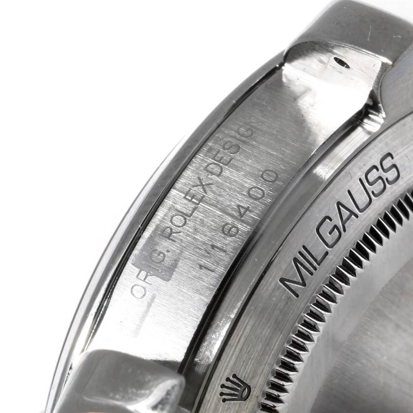 This image shows a close-up of the side and bezel of a Rolex Milgauss 116400 Men
s Stainless Steel Black Dial 116400 Men
s Stainless Steel Black Dial watch, highlighting the engraved model name.