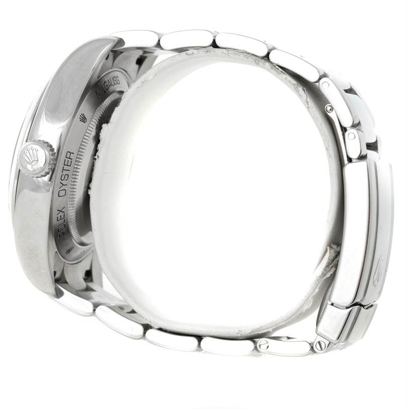 This image shows the side view of a Rolex Milgauss 116400 Men
s Stainless Steel Black Dial 116400 Men
s Stainless Steel Black Dial watch, highlighting the crown, case back, and bracelet.