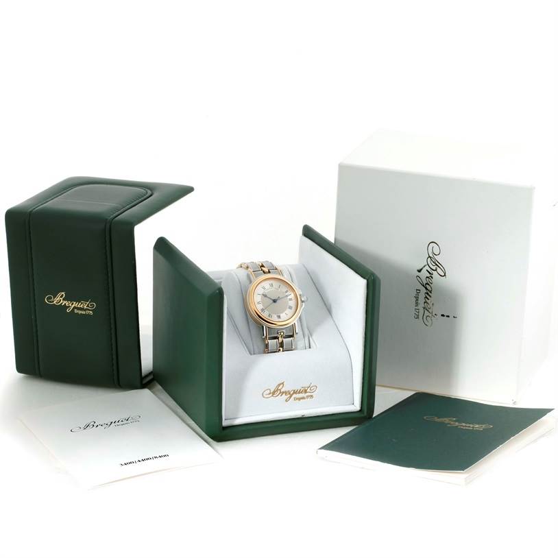 The image shows a Breguet Marine 3400SA/12/X90 Men
s Steel and Gold (two tone) Silver Dial 3400SA/12/X90 Men
s Steel and Gold (two tone) Silver Dial model watch in its open box with accompanying documents and outer packaging visible.
