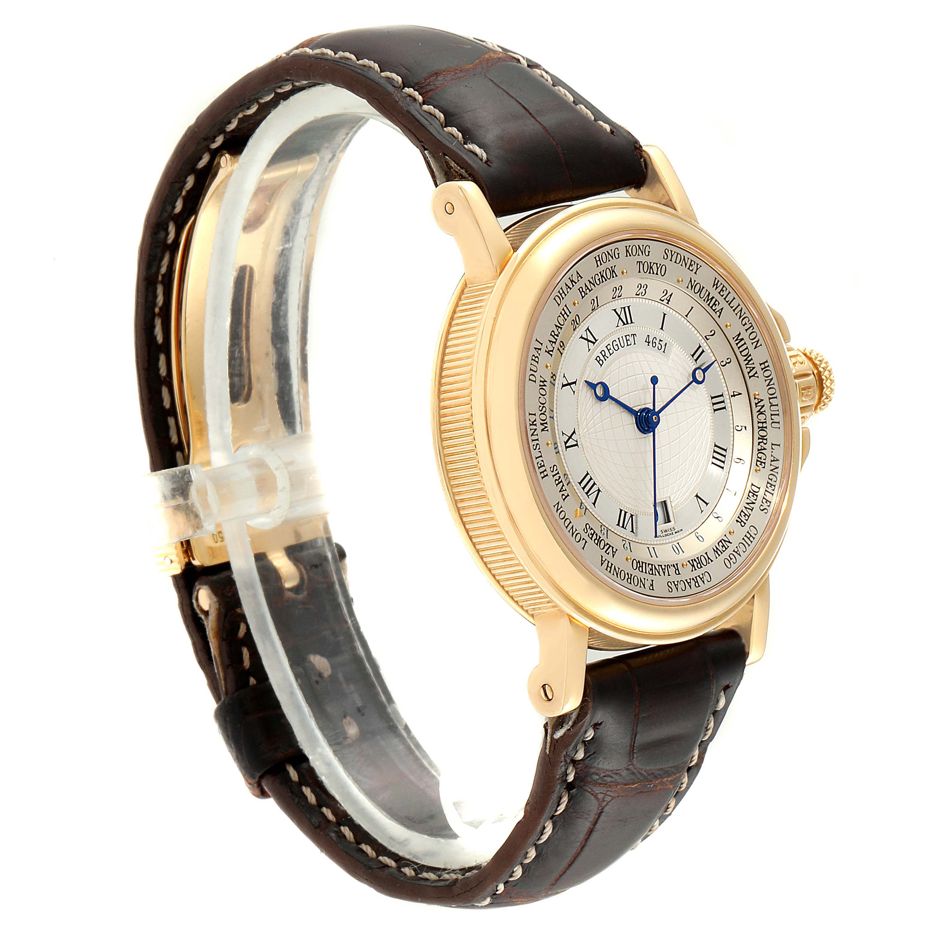 This image shows a side angle view of the Breguet Marine 3700 Men's Yellow Gold Silver Dial 3700 Men's Yellow Gold Silver Dial model watch, highlighting the face, strap, and gold case.