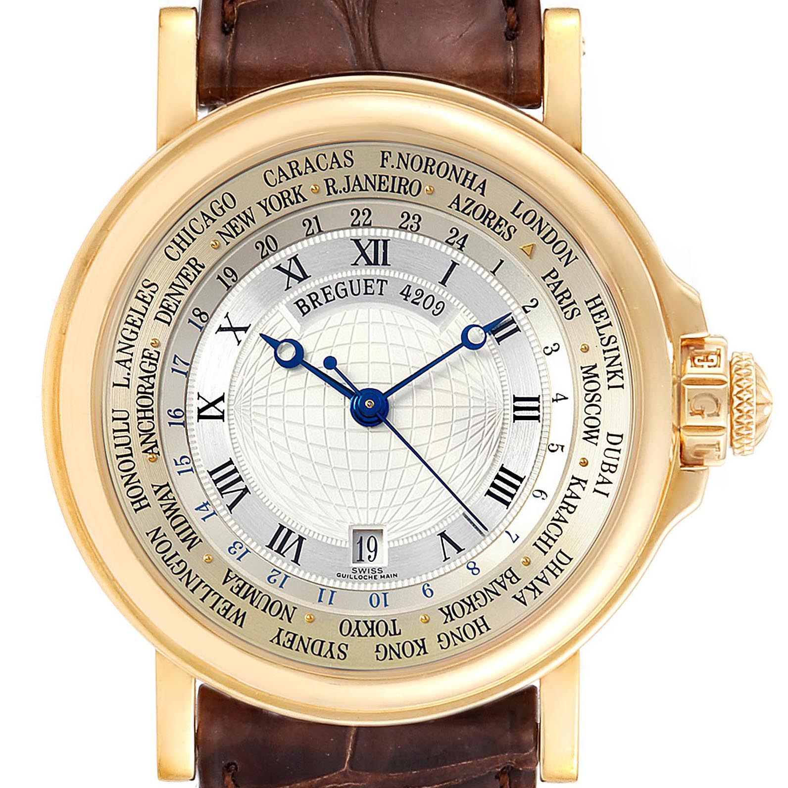 This Breguet Marine Men's Yellow Gold Silver Dial Men's Yellow Gold Silver Dial model watch is shown from a front angle, showcasing the dial, hands, bezel with city names, and part of the leather strap.