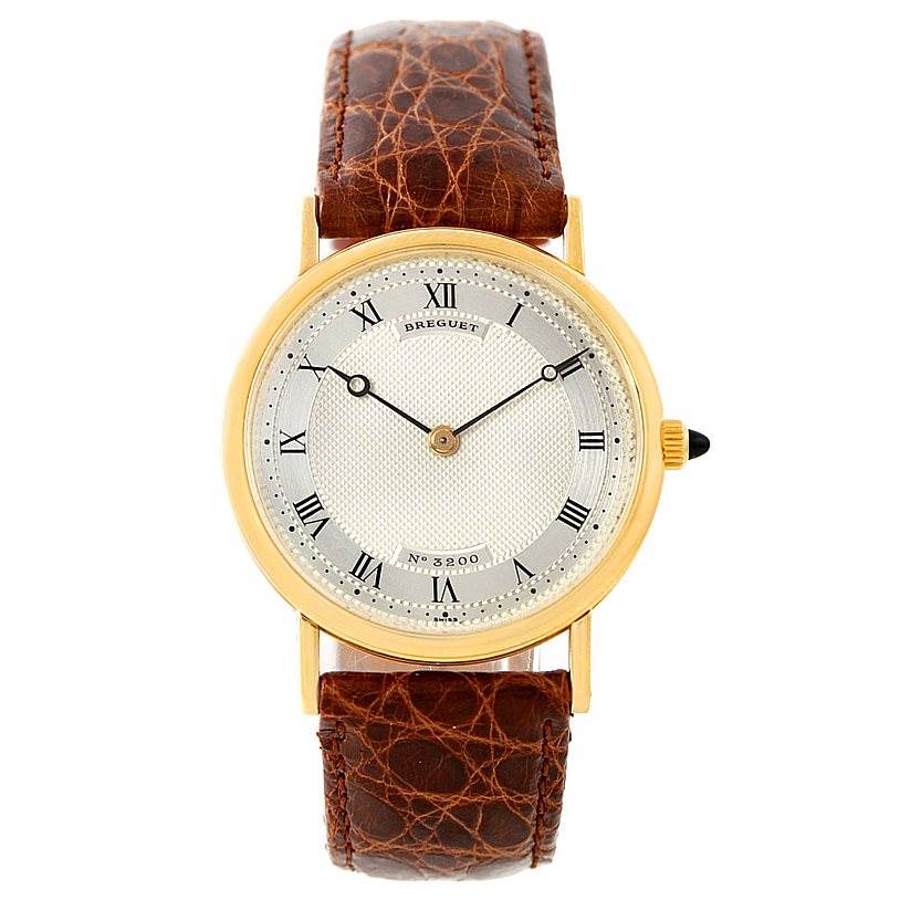 The image shows a front view of a Breguet Classique 3200 Men's Yellow Gold Silver Dial 3200 Men's Yellow Gold Silver Dial watch with a brown leather strap and gold case.
