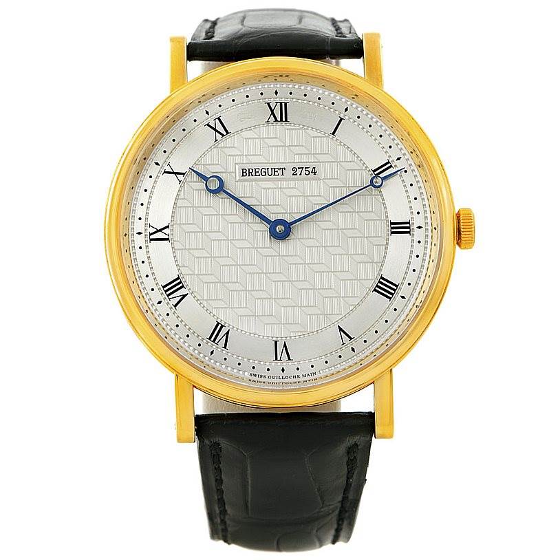This image shows the Breguet Classique 5967 Men's Yellow Gold Silver Dial 5967 Men's Yellow Gold Silver Dial watch face front-on with gold casing and a black leather strap.