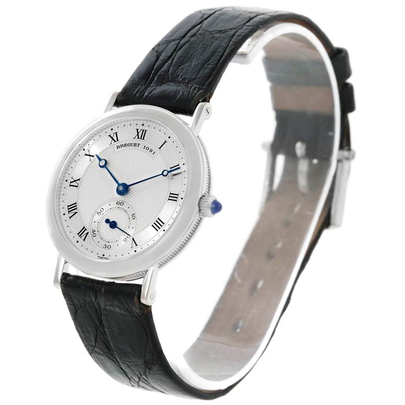 The image shows a Breguet Classique 3210 White Gold Silver Dial 3210 White Gold Silver Dial watch from a front-side angle, highlighting its dial, hands, case, and strap.