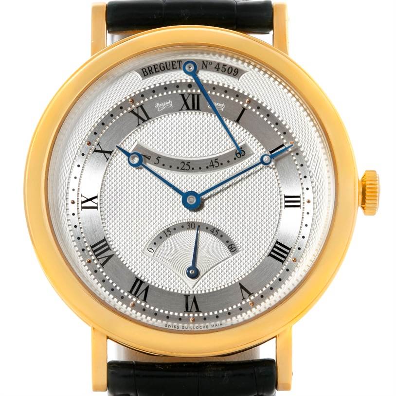 The image shows a front view of the Breguet Classique 5207BA/12/9V6 Men's Yellow Gold Silver Dial 5207BA/12/9V6 Men's Yellow Gold Silver Dial watch, highlighting its dial, hands, and case.