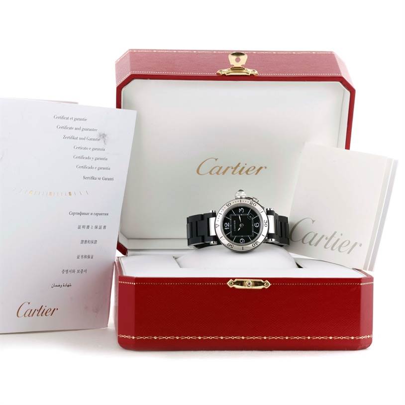 The image displays a Cartier Pasha W3140003 Women's Stainless Steel Black Dial W3140003 Women's Stainless Steel Black Dial watch at a front angle, with its box and accompanying documents.