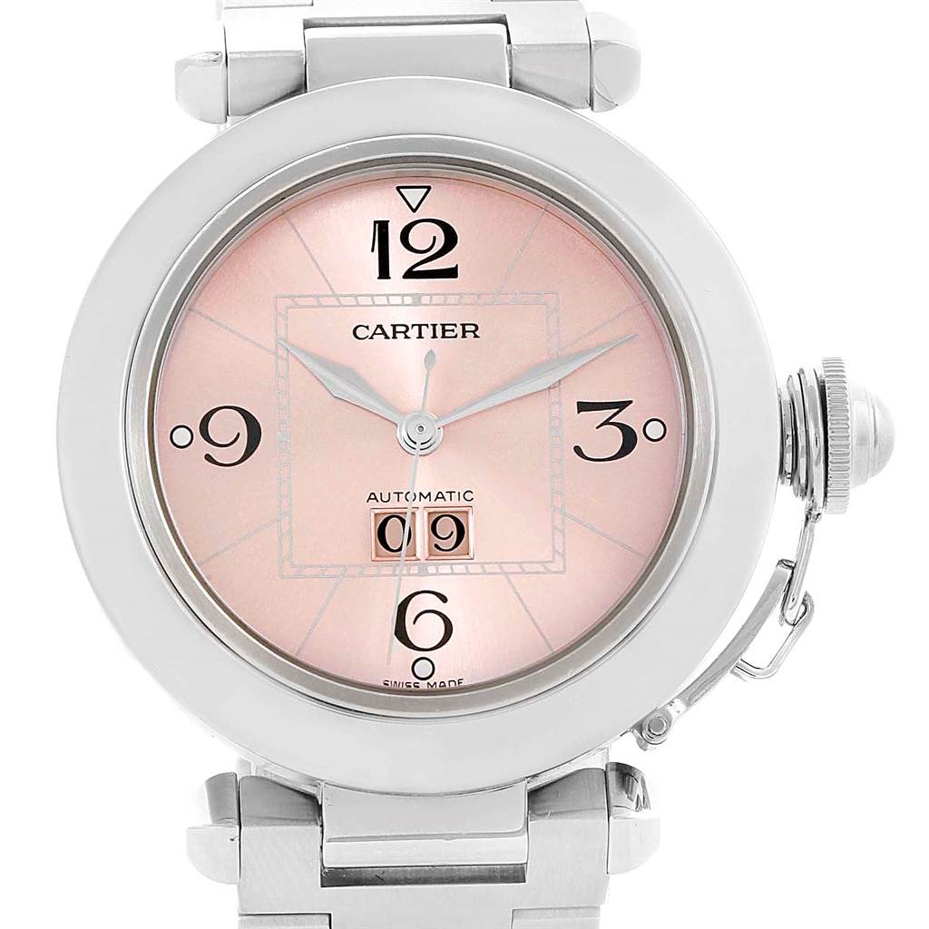 This is a close-up view of the dial and crown of the Cartier Pasha W31058M7 Women's Stainless Steel Pink Dial W31058M7 Women's Stainless Steel Pink Dial watch, showing its face and bracelet links.