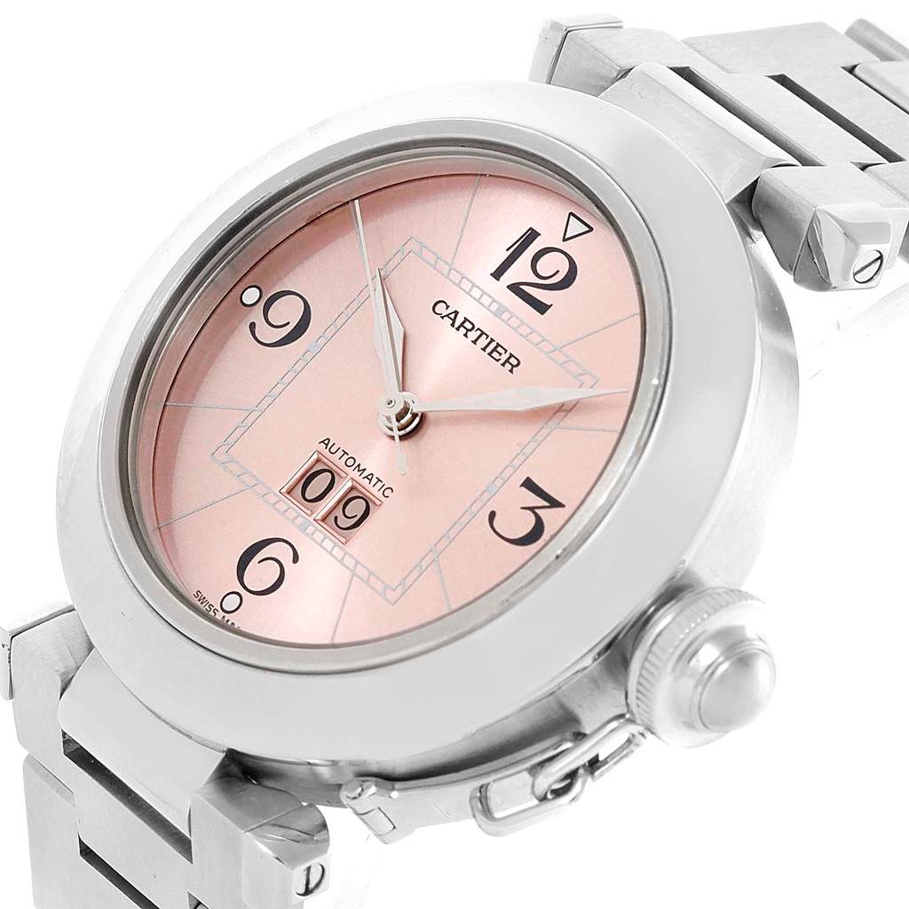 The image shows a close-up of the Cartier Pasha W31058M7 Women's Stainless Steel Pink Dial W31058M7 Women's Stainless Steel Pink Dial watch, highlighting the dial, bezel, and part of the bracelet.