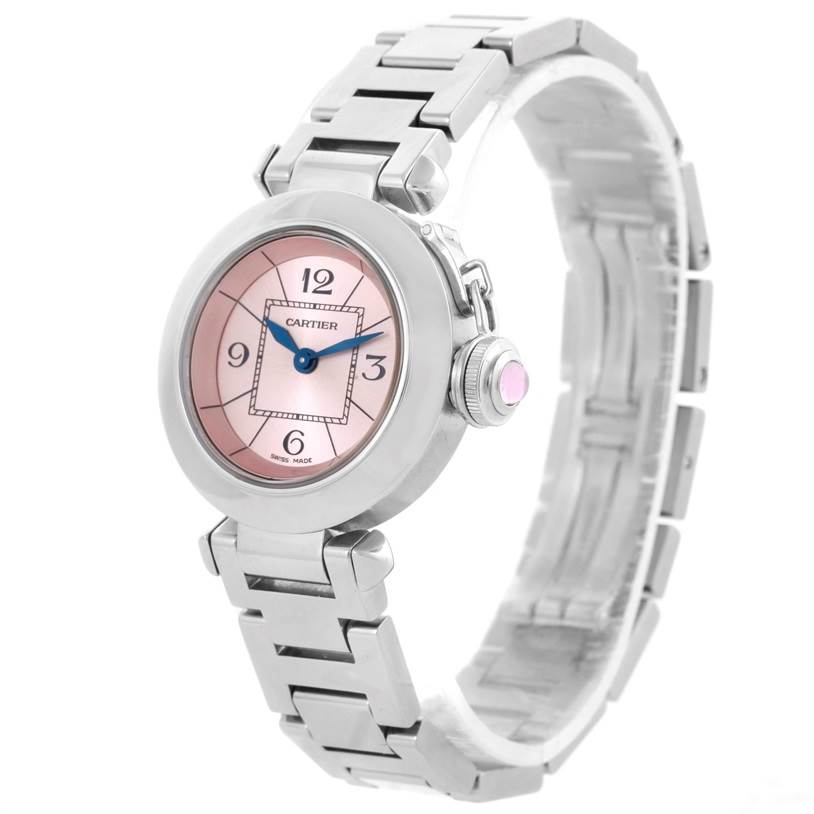 The Cartier Pasha W3140008 Women
s Stainless Steel Pink Dial W3140008 Women
s Stainless Steel Pink Dial watch is shown at a three-quarter angle, highlighting its pink dial, blue hands, and stainless steel bracelet.