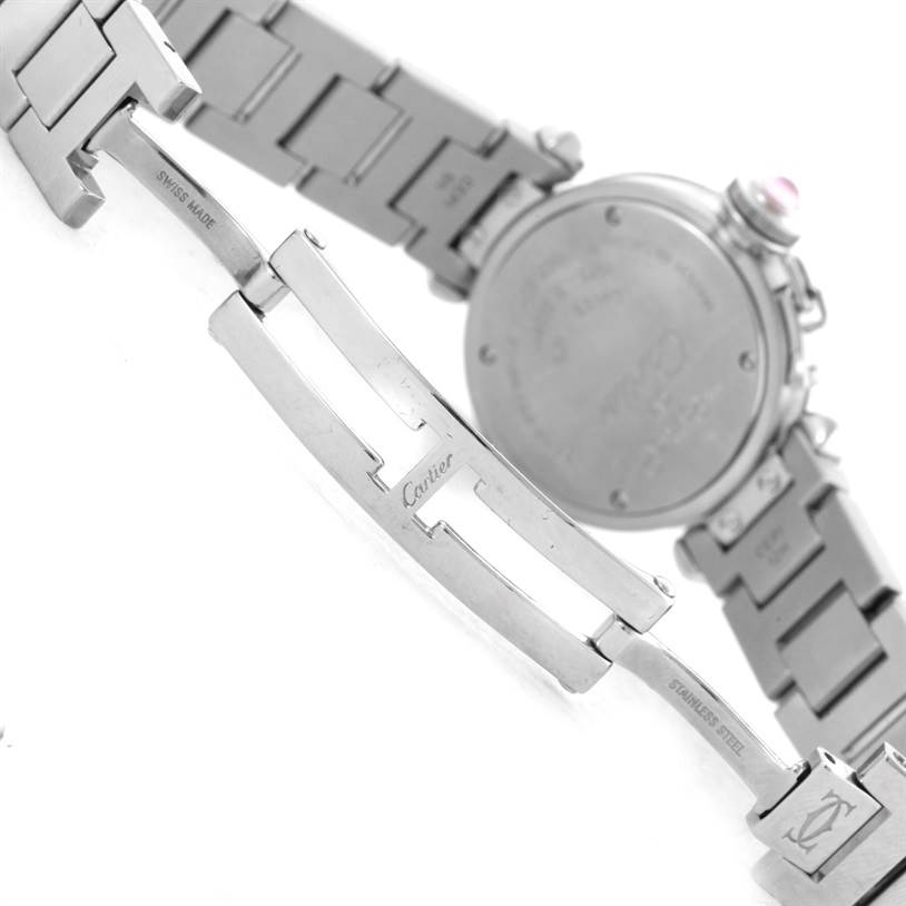 The image shows a close-up of the back and clasp of a Cartier Pasha W3140008 Women
s Stainless Steel Pink Dial W3140008 Women
s Stainless Steel Pink Dial watch, highlighting the stainless steel bracelet and engraved clasp.