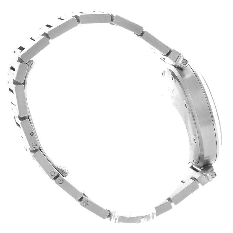 The image shows a side view of the Cartier Pasha W31058M7 Women
s Stainless Steel Pink Dial W31058M7 Women
s Stainless Steel Pink Dial watch focusing on the metal bracelet and the side of the watch case.