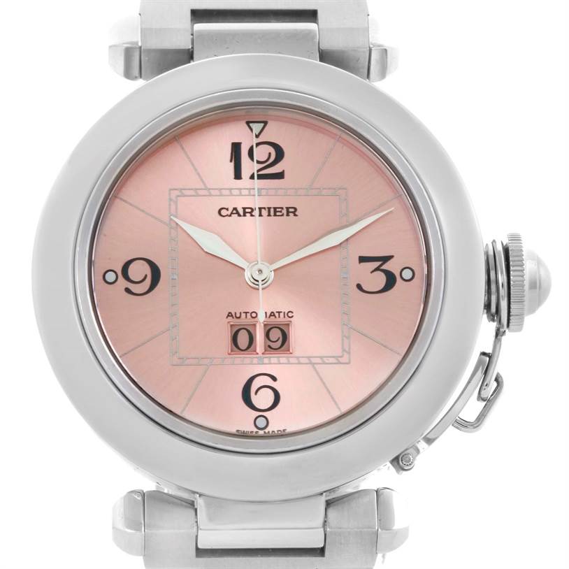 This Cartier Pasha W31058M7 Women
s Stainless Steel Pink Dial W31058M7 Women
s Stainless Steel Pink Dial watch is shown from a front angle, displaying its face, bezel, dial, hands, and part of the strap.