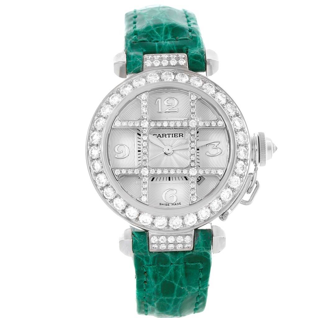 The image shows a front view of a Cartier Pasha WJ116136 Men's White Gold Silver Dial WJ116136 Men's White Gold Silver Dial watch with a green strap and a diamond-encrusted bezel and dial.