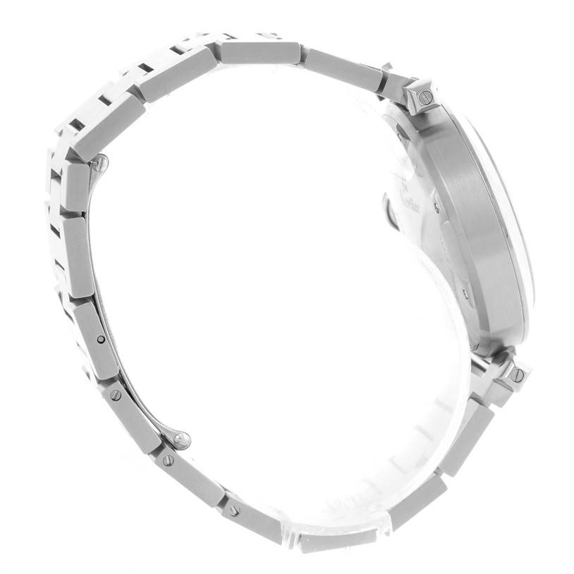 The image shows a side view of the Cartier Pasha W31058M7 Women
s Stainless Steel Pink Dial W31058M7 Women
s Stainless Steel Pink Dial watch, focusing on the bracelet and case details.