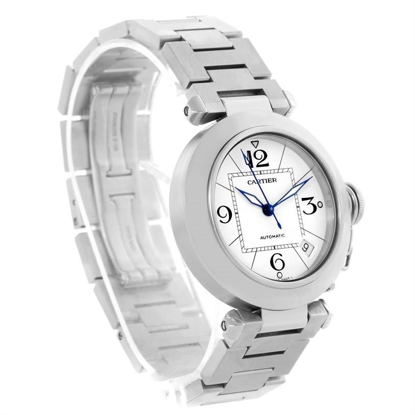 The image shows a Cartier Pasha W31074M7 Women's Stainless Steel White Dial W31074M7 Women's Stainless Steel White Dial watch at a three-quarter angle, displaying its face, bracelet, and crown.