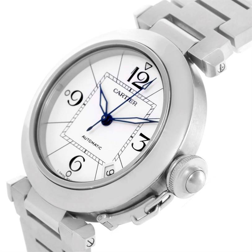 This image shows a close-up angle of the dial, crown, and part of the bracelet of the Cartier Pasha W31074M7 Women's Stainless Steel White Dial W31074M7 Women's Stainless Steel White Dial model watch.