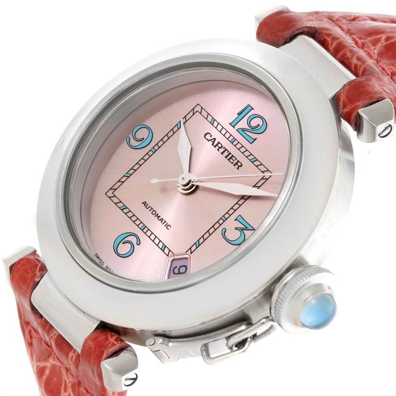 The image shows a Cartier Pasha W3108199 Women's Stainless Steel Pink Dial W3108199 Women's Stainless Steel Pink Dial watch at an angle highlighting the dial, crown, hands, and part of the strap.