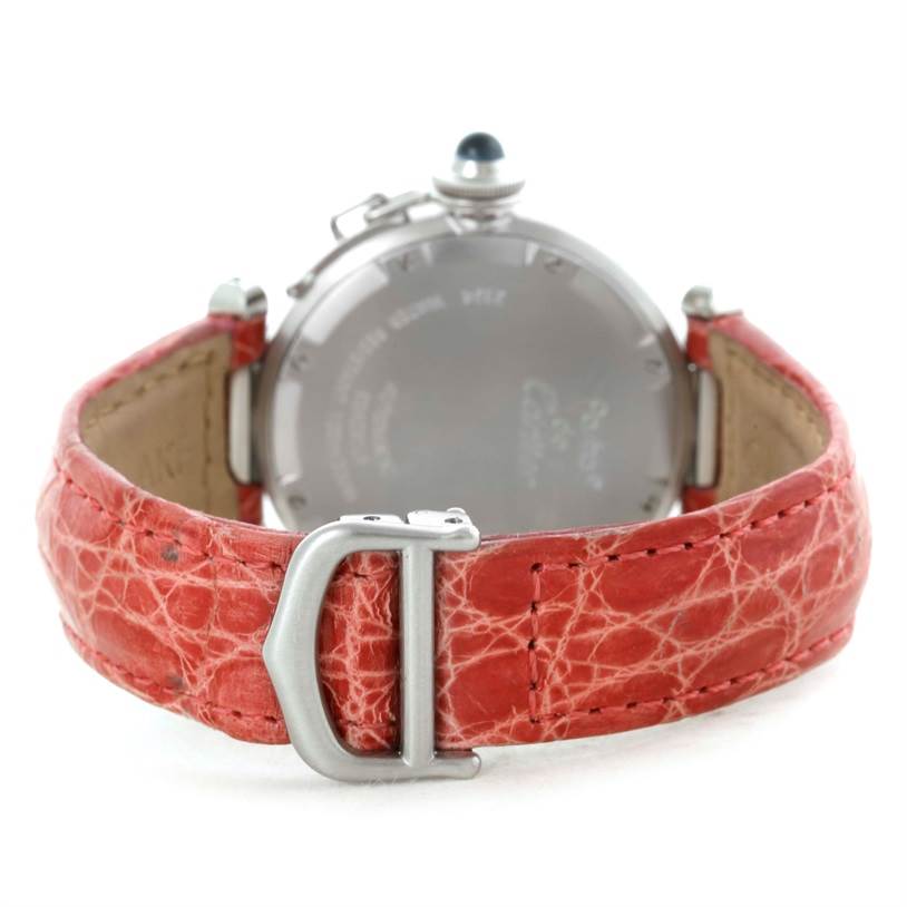 The image shows the back of a Cartier Pasha W3108199 Women's Stainless Steel Pink Dial W3108199 Women's Stainless Steel Pink Dial watch with a red leather strap and a visible buckle.