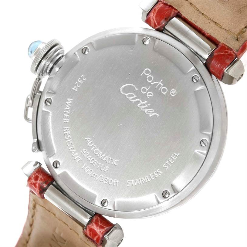The image shows the back of a Cartier Pasha W3108199 Women's Stainless Steel Pink Dial W3108199 Women's Stainless Steel Pink Dial watch, highlighting its case back, leather straps, and crown protector.