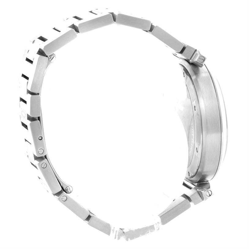 This side view of the Cartier Pasha W31074M7 Women's Stainless Steel White Dial W31074M7 Women's Stainless Steel White Dial watch shows the metal bracelet and the edge of the watch case.