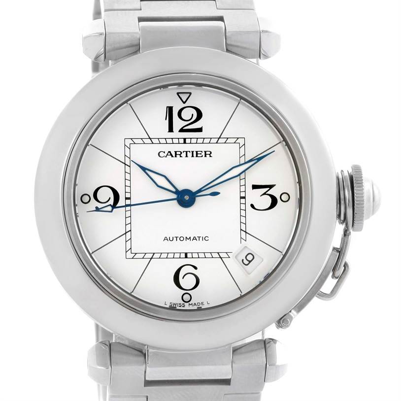 The image shows a front view of the Cartier Pasha W31074M7 Women's Stainless Steel White Dial W31074M7 Women's Stainless Steel White Dial watch, highlighting the face, dial, hands, and part of the metal bracelet.