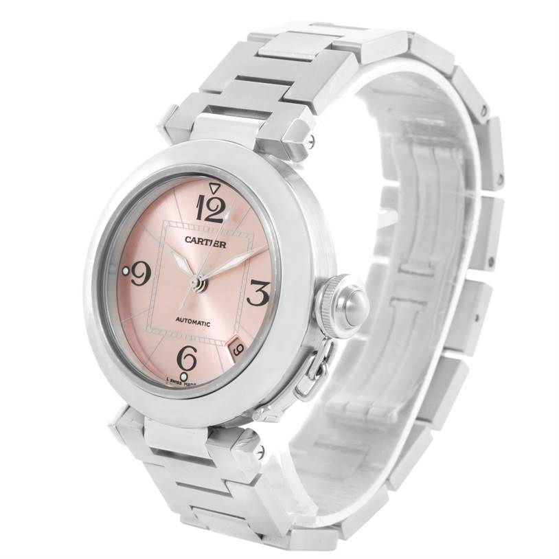 The image shows a Cartier Pasha W31075M7 Women
s Stainless Steel Pink Dial W31075M7 Women
s Stainless Steel Pink Dial watch at a three-quarter angle, highlighting its face, crown, bezel, and metal bracelet.