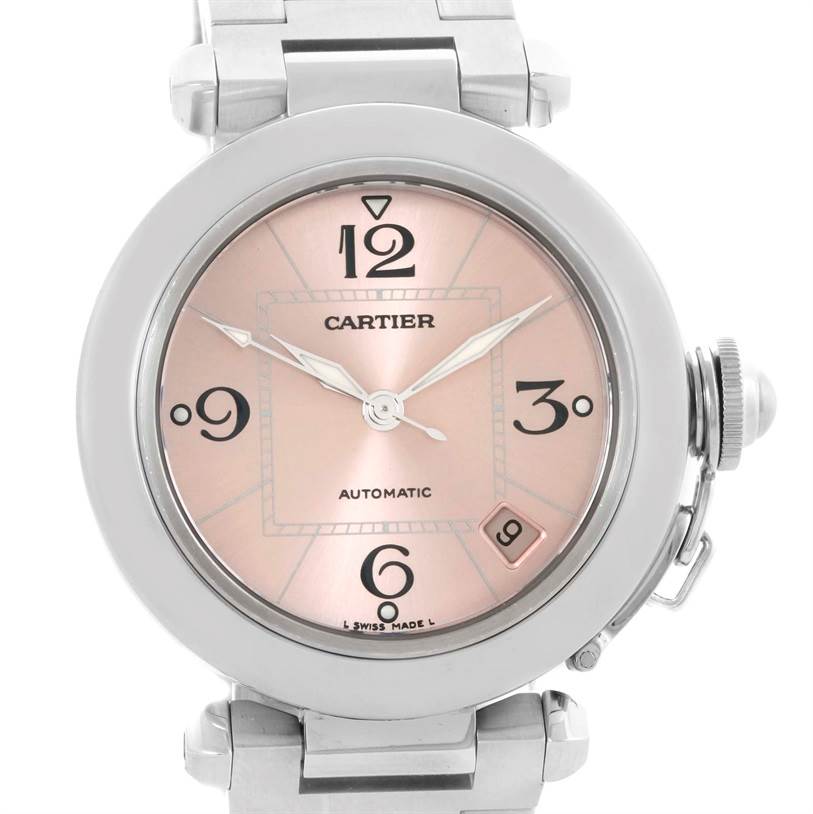 The Cartier Pasha W31075M7 Women
s Stainless Steel Pink Dial W31075M7 Women
s Stainless Steel Pink Dial watch is shown from a front angle, highlighting the dial, hour markers, hands, and part of the bracelet.