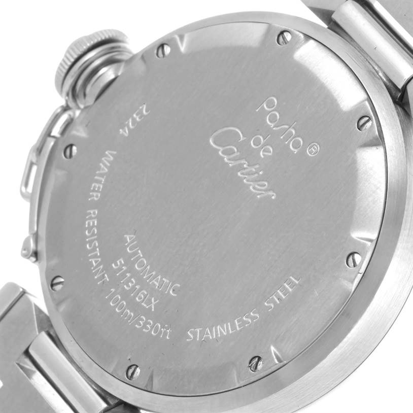 This image shows the back case of a Pasha de Cartier watch, displaying its engravings and part of the bracelet.