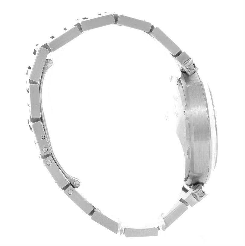 The image shows a side view of the Cartier Pasha W31075M7 Women
s Stainless Steel Pink Dial W31075M7 Women
s Stainless Steel Pink Dial watch, highlighting its stainless steel bracelet and watch case.