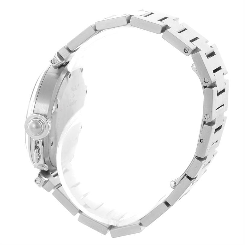 This image shows the side profile of a Cartier Pasha W31074M7 Stainless Steel White Dial W31074M7 Stainless Steel White Dial watch, highlighting the crown and bracelet.