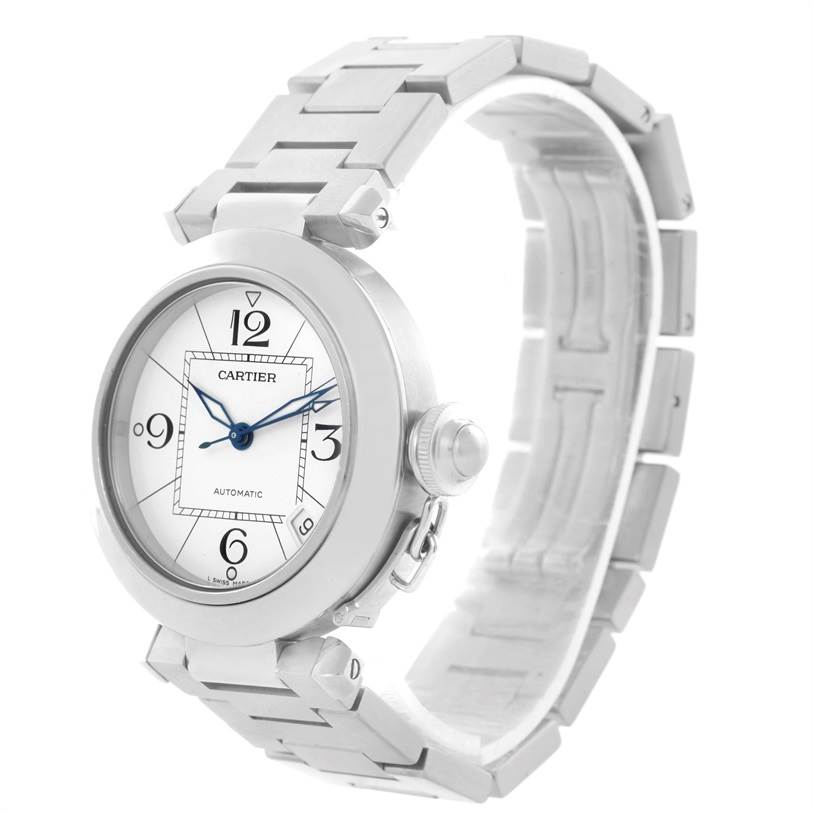 The image shows a Cartier Pasha W31074M7 Women's Stainless Steel White Dial W31074M7 Women's Stainless Steel White Dial watch at a three-quarter angle, highlighting its dial, case, and metal bracelet.