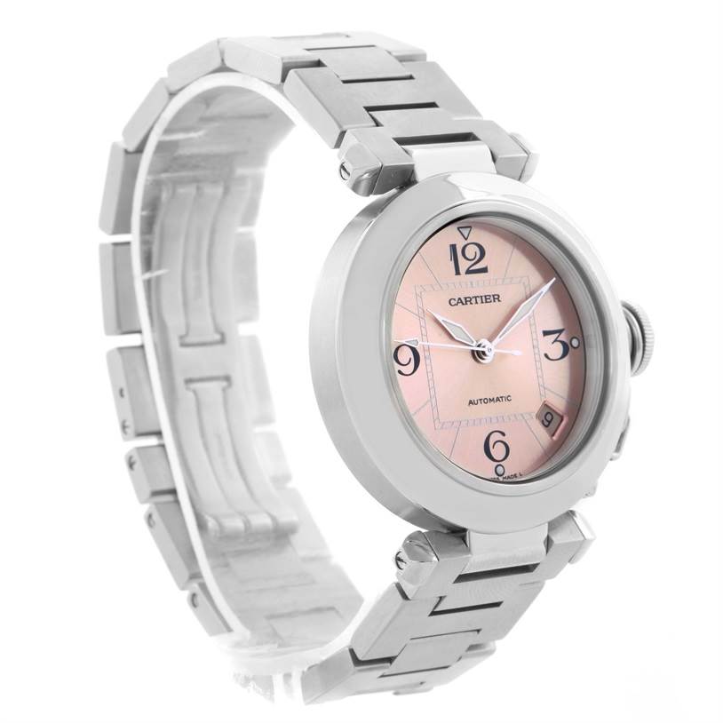 The image shows a Cartier Pasha W31075M7 Women
s Stainless Steel Pink Dial W31075M7 Women
s Stainless Steel Pink Dial watch at a three-quarter angle, highlighting its face, bracelet, and side crown.