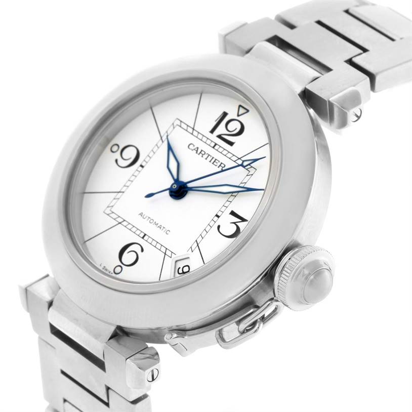 The image shows a Cartier Pasha W31074M7 Women's Stainless Steel White Dial W31074M7 Women's Stainless Steel White Dial watch at an angle that highlights the dial, crown, and part of the bracelet.