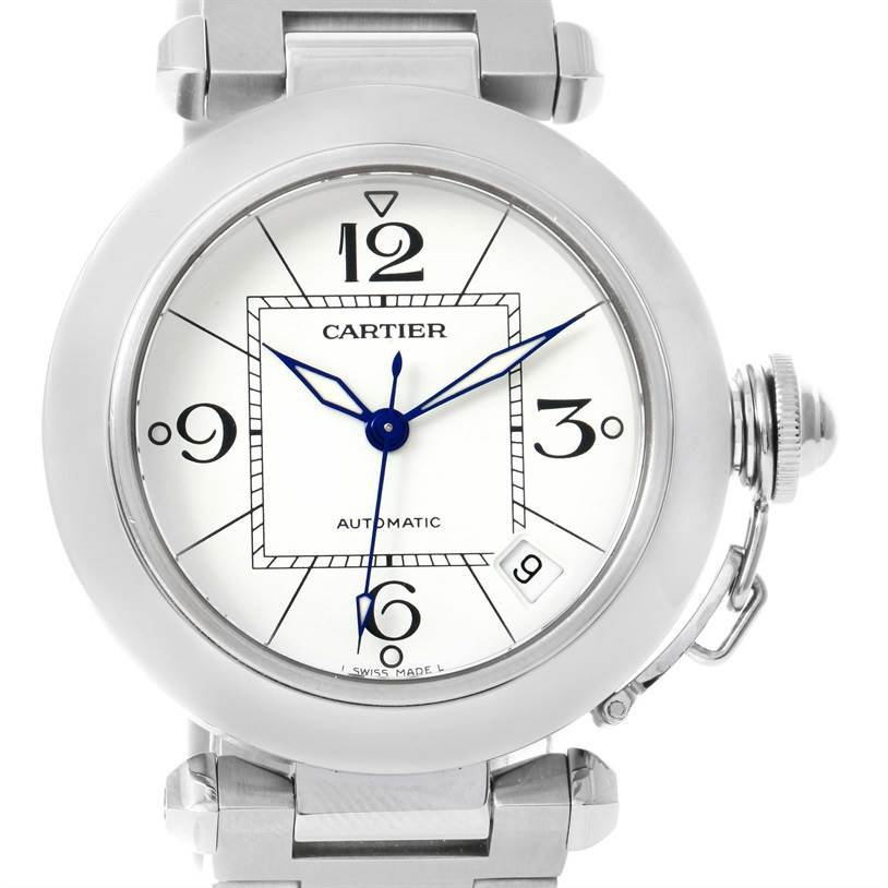 The image shows a close-up view of the Cartier Pasha W31074M7 Women's Stainless Steel White Dial W31074M7 Women's Stainless Steel White Dial watch face, including its dial, hands, and part of the bracelet.