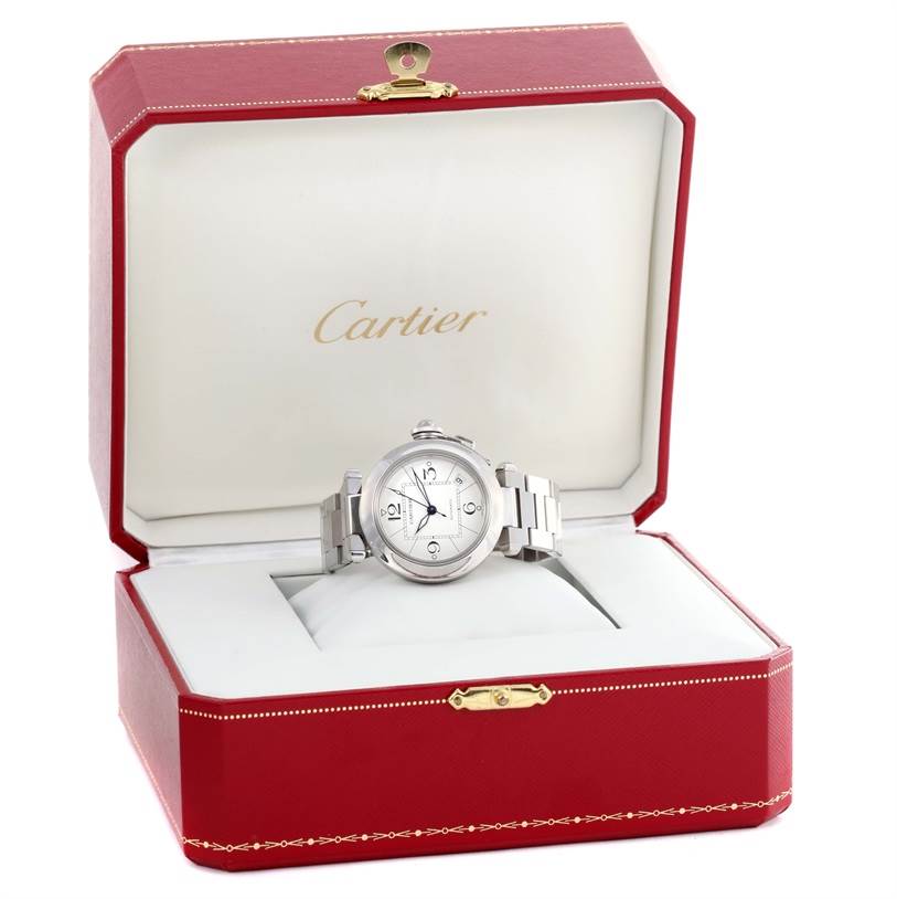 The image shows a Cartier Pasha W31074M7 Women's Stainless Steel White Dial W31074M7 Women's Stainless Steel White Dial watch displayed in an open red Cartier box photographed from the front.