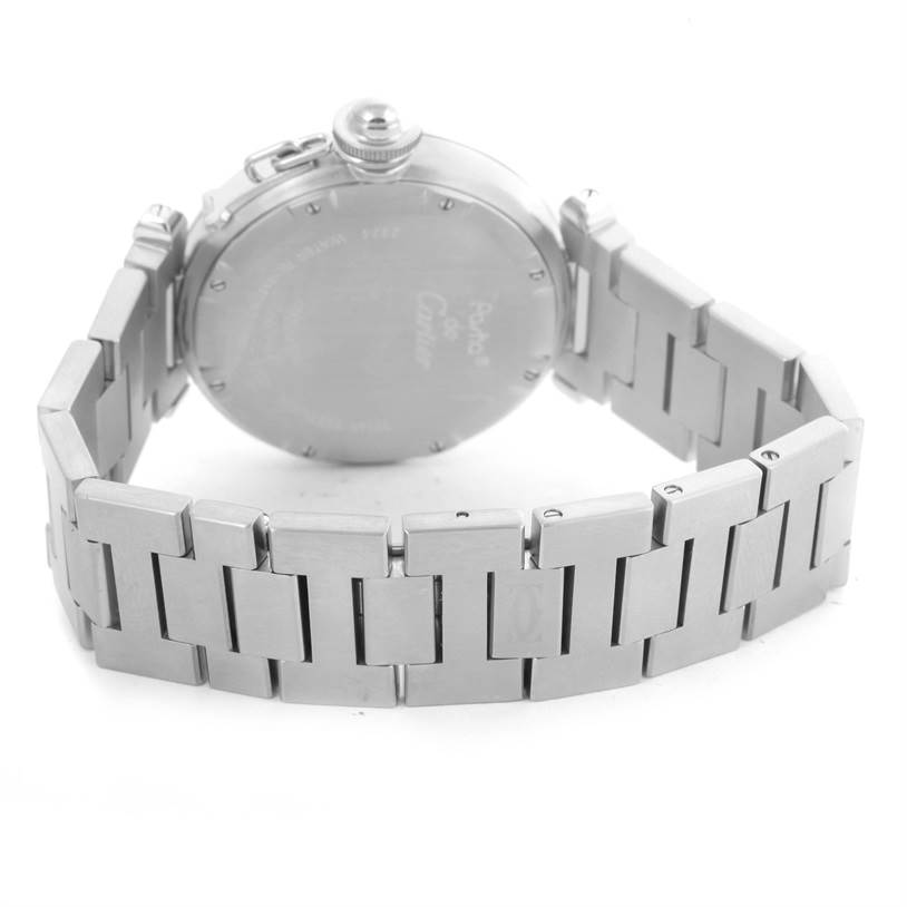 The image shows the back view of a Cartier Pasha W31074M7 Women's Stainless Steel White Dial W31074M7 Women's Stainless Steel White Dial watch, highlighting its case back and stainless steel bracelet.