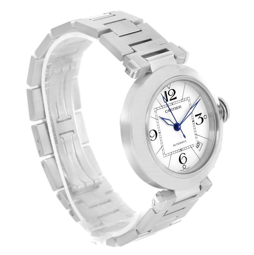 The image shows a side angle view of the Cartier Pasha W31074M7 Women's Stainless Steel White Dial W31074M7 Women's Stainless Steel White Dial watch, highlighting its face, dial, and metal bracelet.