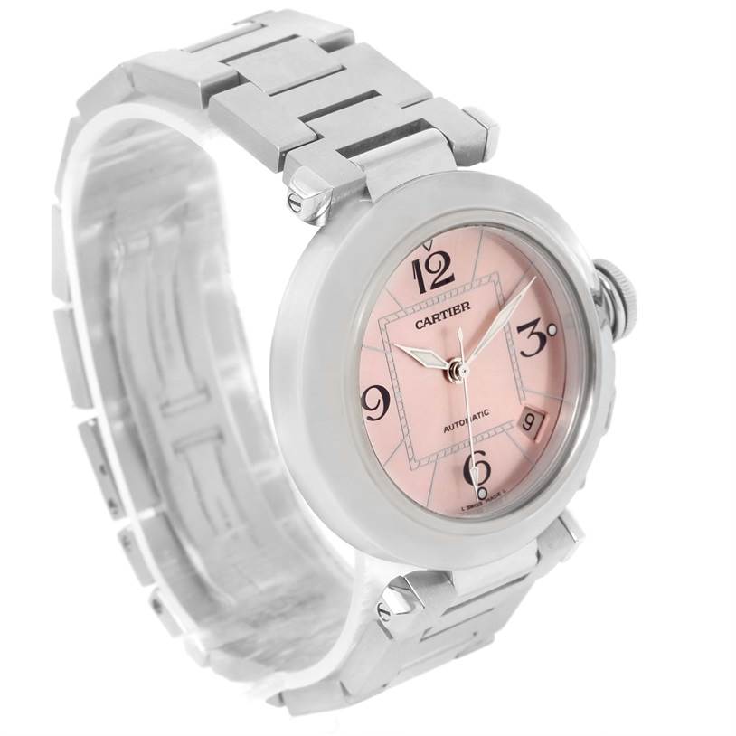 The Cartier Pasha W31075M7 Women's Stainless Steel Pink Dial W31075M7 Women's Stainless Steel Pink Dial watch is shown at a slight angle, highlighting the face, dial, and metal bracelet.