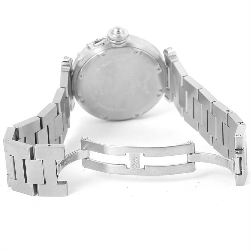 The image shows the back of a Cartier Pasha W31055M7 Women's Stainless Steel White Dial W31055M7 Women's Stainless Steel White Dial watch and its open metal bracelet clasp.