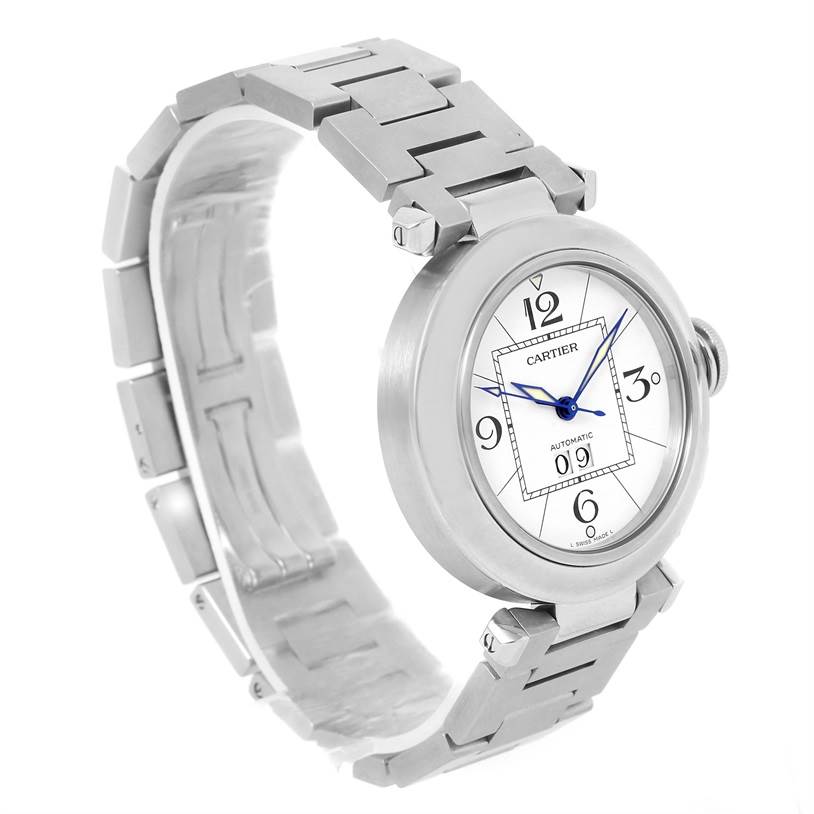 The image shows a Cartier Pasha W31055M7 Women's Stainless Steel White Dial W31055M7 Women's Stainless Steel White Dial watch angled to display its round face and linked metal bracelet.