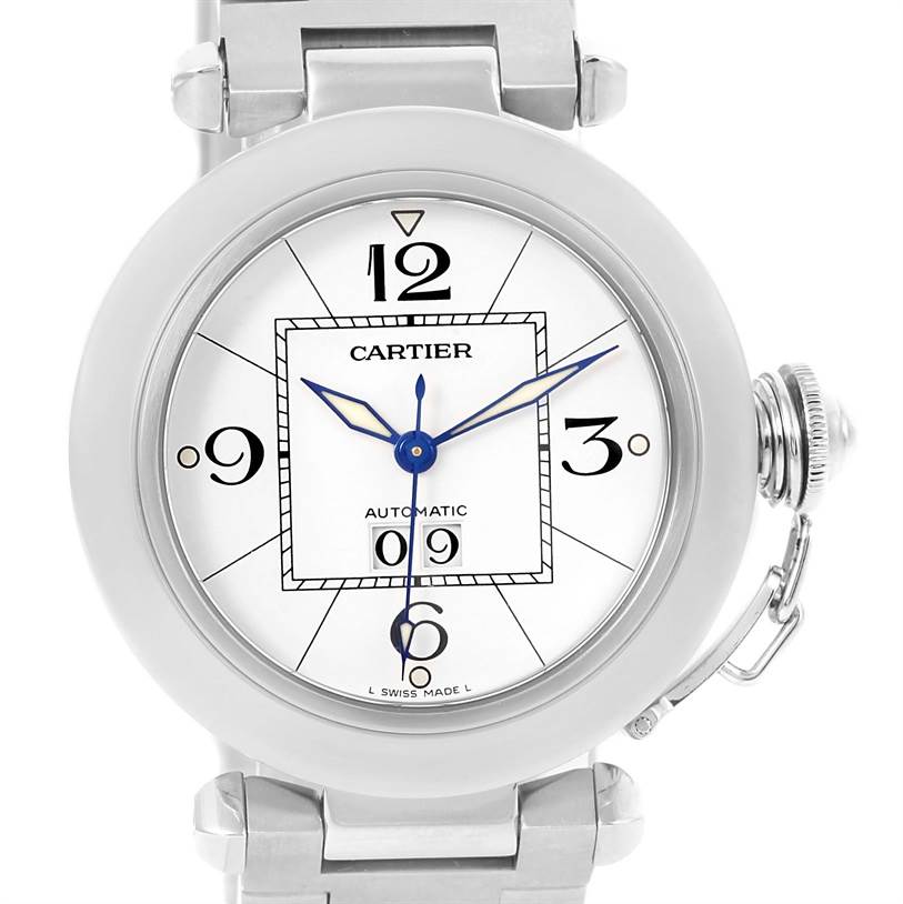 The image shows the Cartier Pasha W31055M7 Women's Stainless Steel White Dial W31055M7 Women's Stainless Steel White Dial watch face, bezel, crown guard, and part of the bracelet from a front angle.