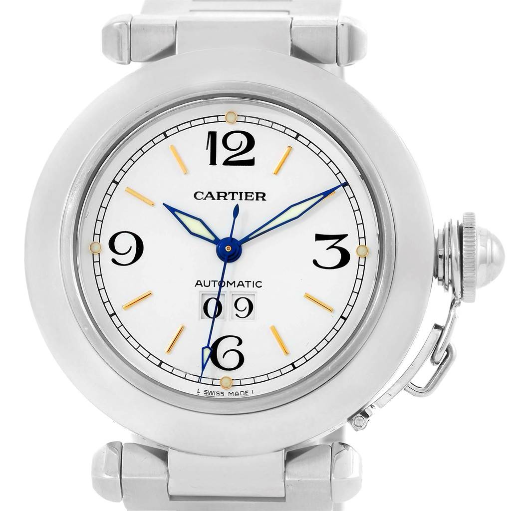 The image shows a front view of the Cartier Pasha W31044M7 Men's Stainless Steel White Dial W31044M7 Men's Stainless Steel White Dial watch with its white dial, blue hands, and crown guard prominently displayed.