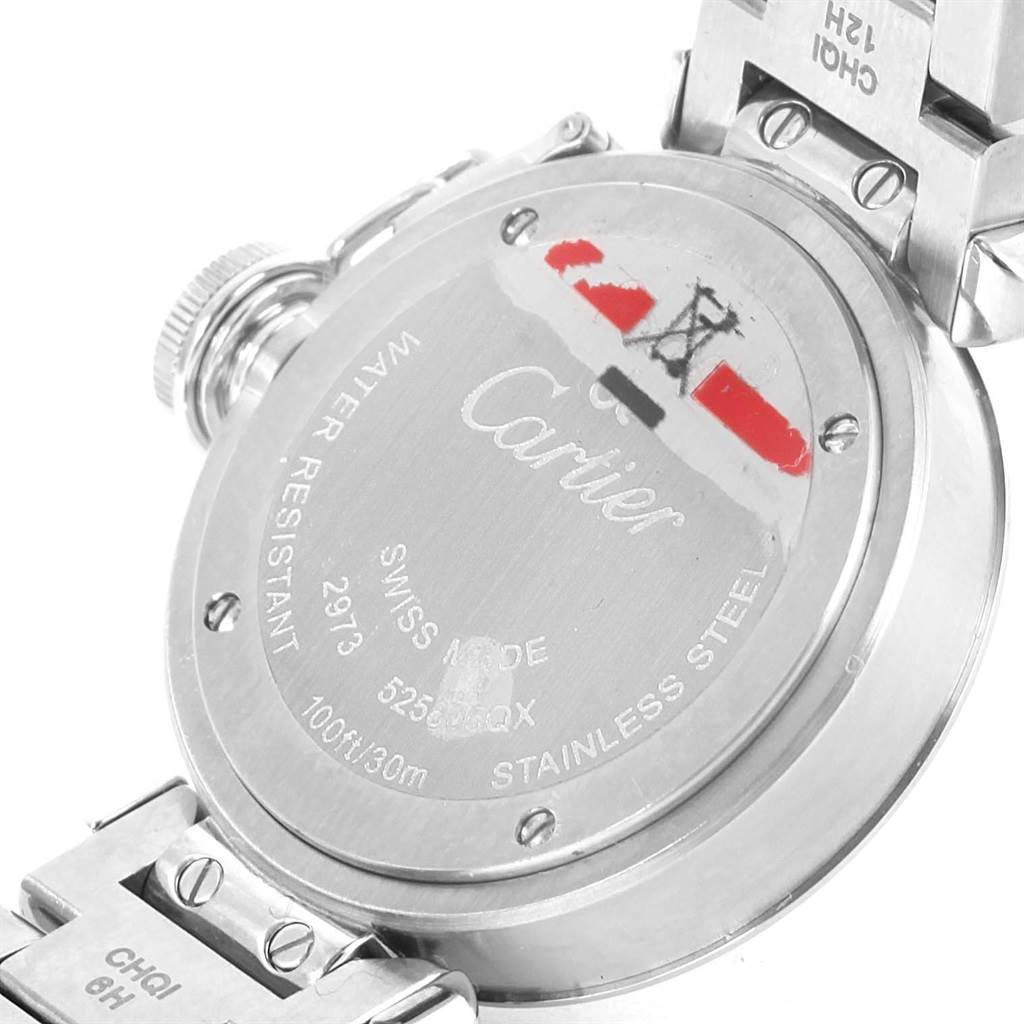 The image shows the back case of a Cartier Pasha W3140008 Women's Stainless Steel Pink Dial W3140008 Women's Stainless Steel Pink Dial watch, displaying the engravings and part of the bracelet.