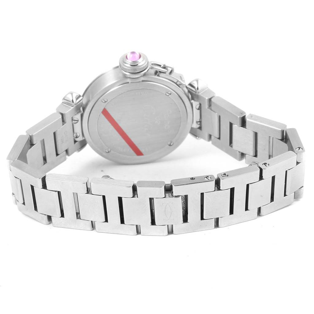 The image shows the back view of a Cartier Pasha W3140008 Women's Stainless Steel Pink Dial W3140008 Women's Stainless Steel Pink Dial watch, highlighting the stainless steel bracelet and case back with a pink cabochon crown.