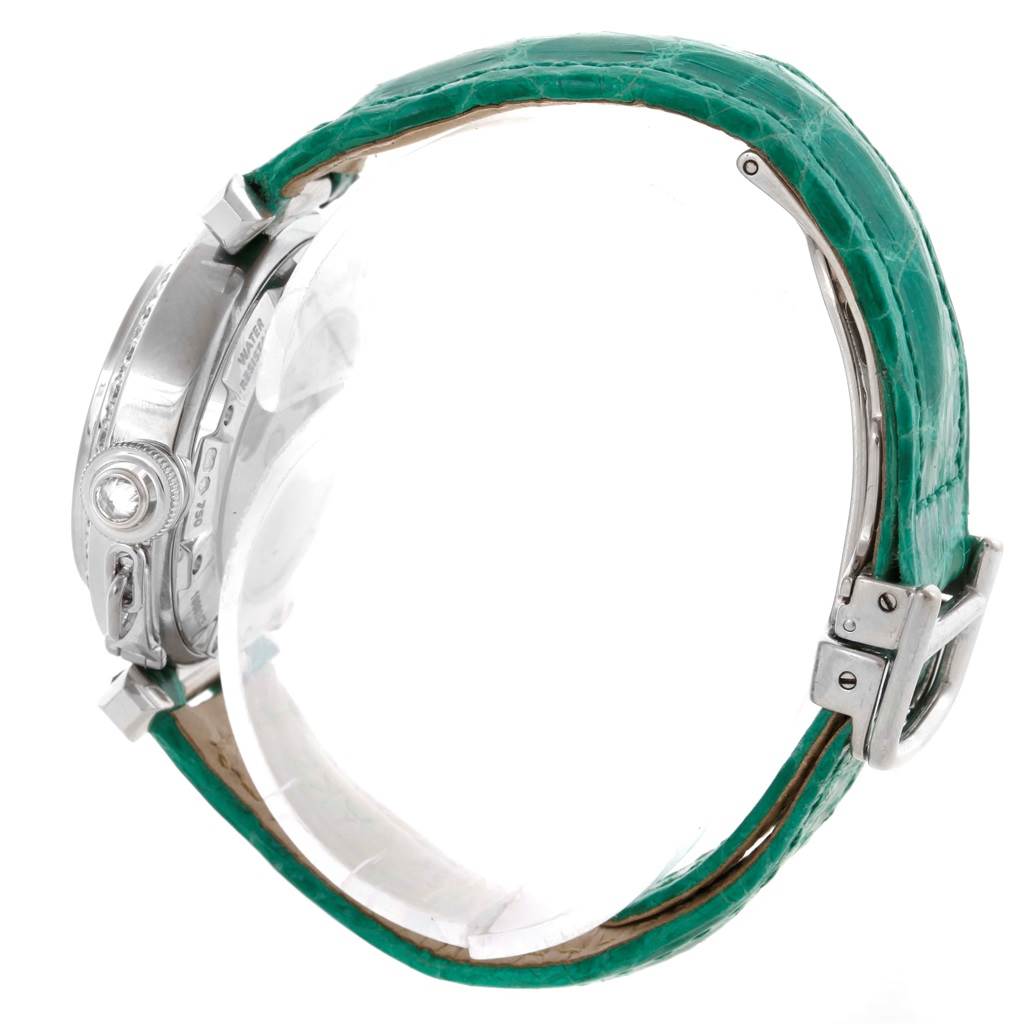 The image shows a side view of a Cartier Pasha WJ116136 Men's White Gold Silver Dial WJ116136 Men's White Gold Silver Dial watch, featuring the crown and green strap.