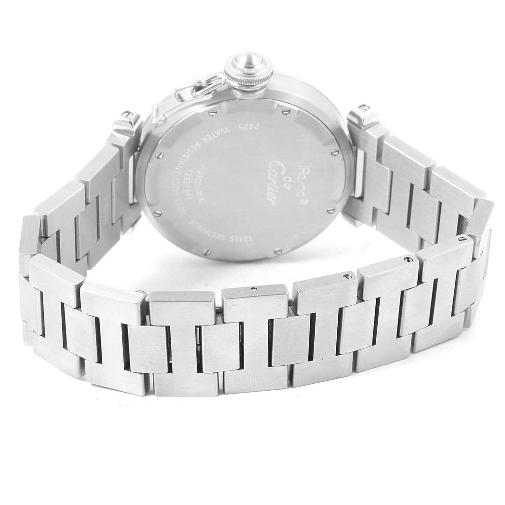 This image shows the back of the Cartier Pasha W31058M7 Women's Stainless Steel Pink Dial W31058M7 Women's Stainless Steel Pink Dial watch, specifically the case back and metal bracelet.