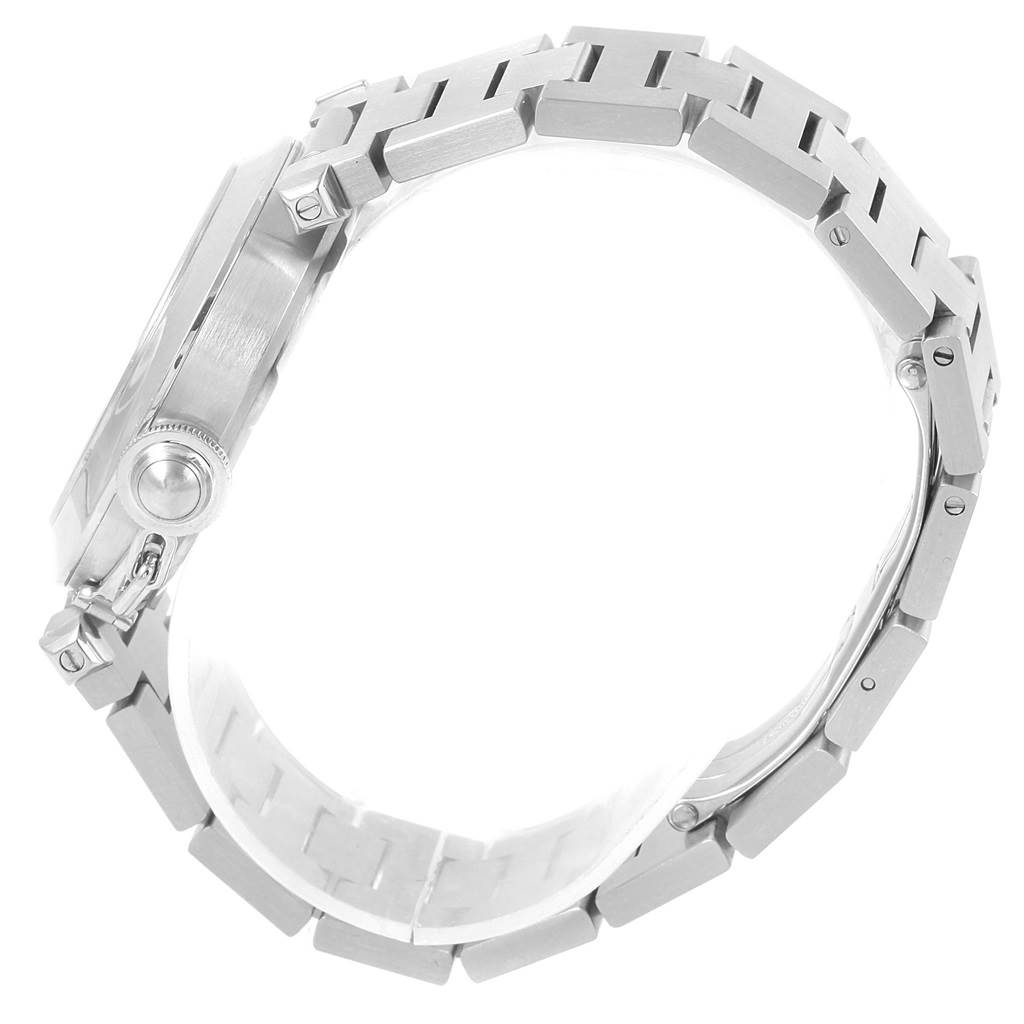 The image shows the side profile of a Cartier Pasha W31058M7 Women's Stainless Steel Pink Dial W31058M7 Women's Stainless Steel Pink Dial watch, highlighting its case, crown, and metal bracelet.