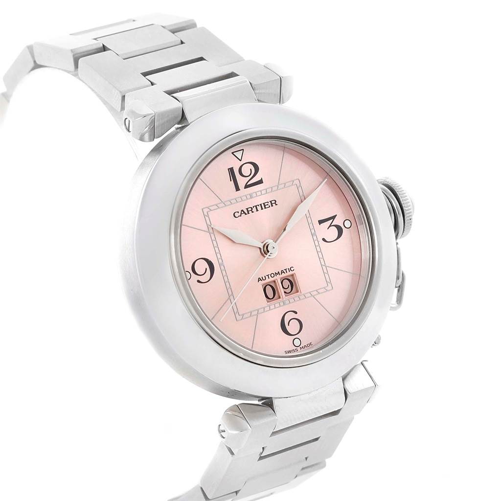 The image shows a Cartier Pasha W31058M7 Women's Stainless Steel Pink Dial W31058M7 Women's Stainless Steel Pink Dial watch angled to display the pink dial, case, crown, and part of the bracelet.