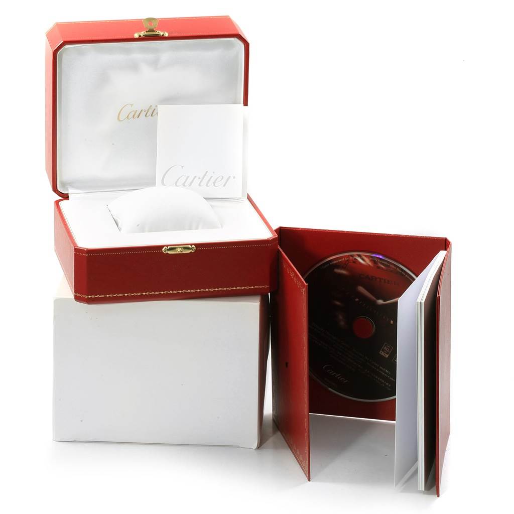 The image shows the Pasha model by Cartier packaging including the box, booklet, and CD from a front angle.
