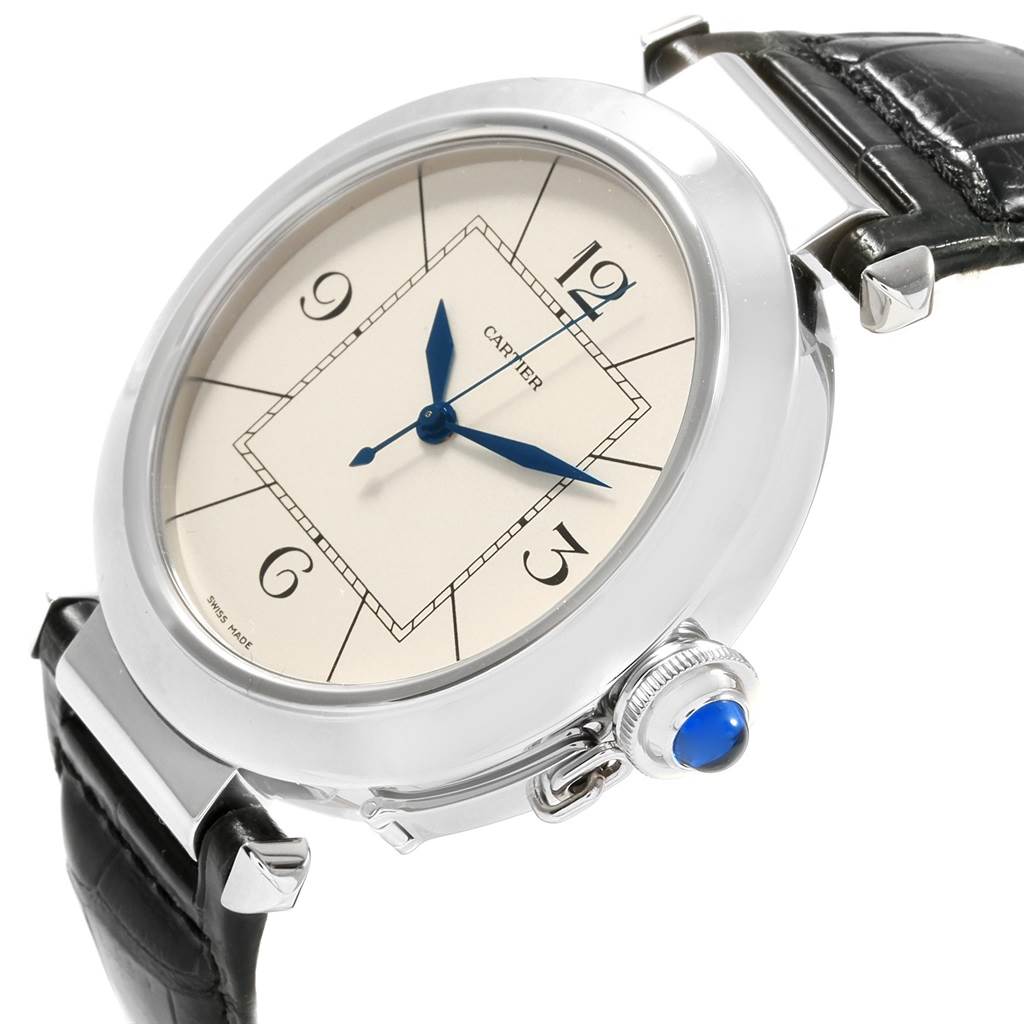 The image shows a Cartier Pasha W3107255 Men's Stainless Steel Silver Dial W3107255 Men's Stainless Steel Silver Dial watch from an angled side view, highlighting the face, blue hands, and crown with a blue gem.